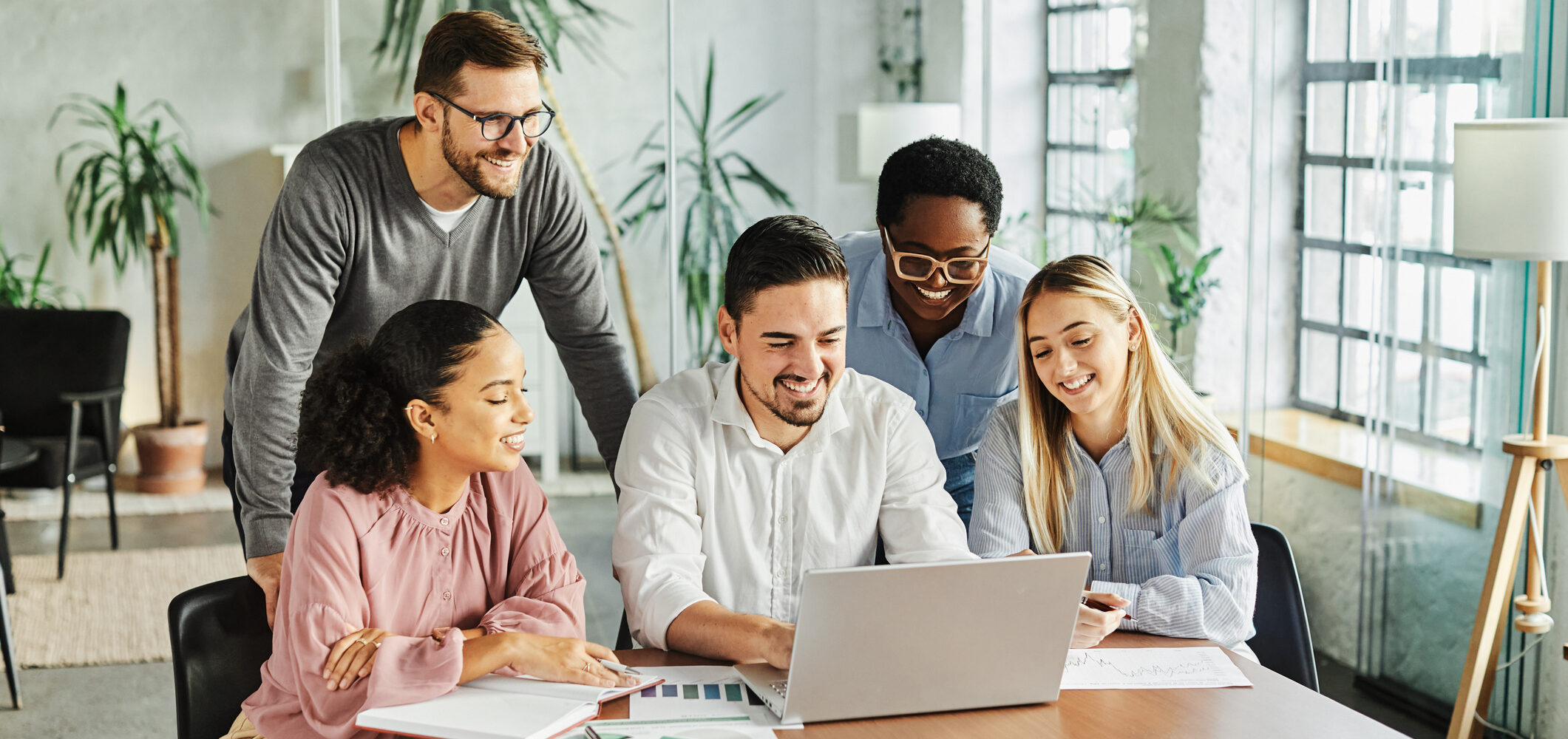 young business people meeting office teamwork group laptop presentation seminar businesswoman startup creative training businessman leader student education teaching coach brainstorming computer technology CSRD Platform